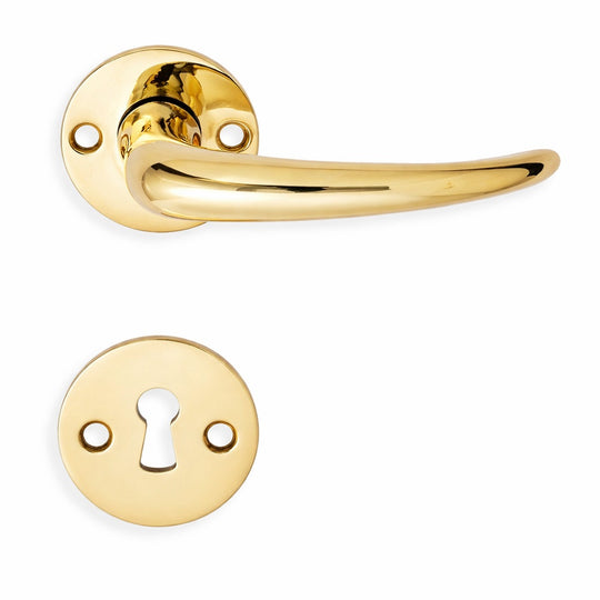 Coupé door handle in unlacquered polished brass, with rose and keyhole escutcheon, 30 mm fixing centres