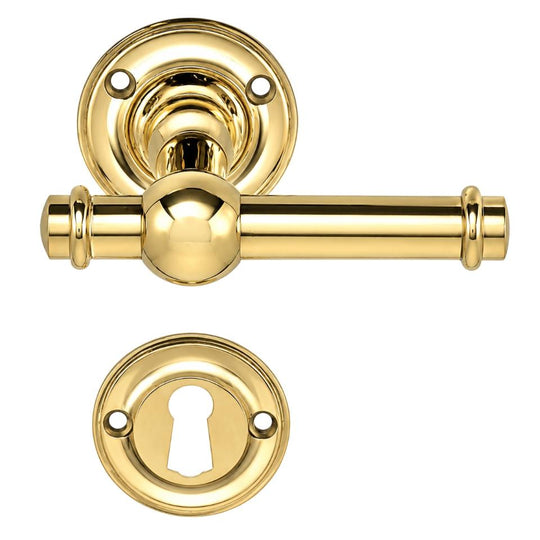 Ordrup door handle in polished brass, with rose and keyhole escutcheon (large model)