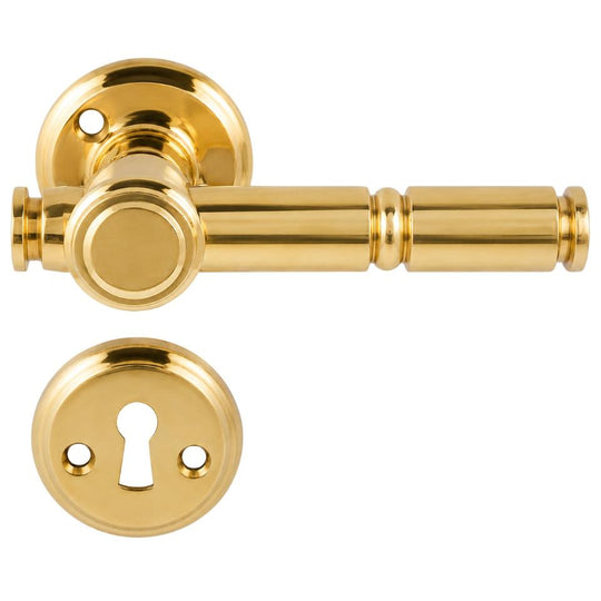 Skovshoved door handle in unlacquered polished brass, with rose and keyhole escutcheon