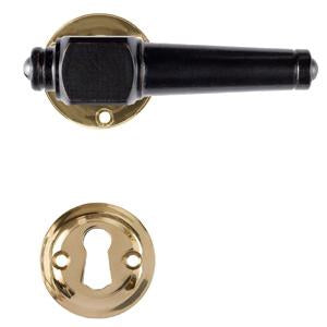 Svanemølle black wood door handle with rose and keyhole escutcheon in unlacquered polished brass