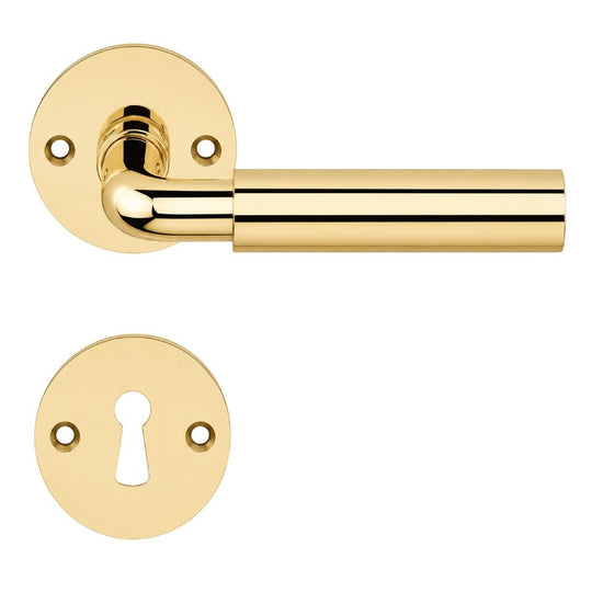 Funkis Espergærde door handle in polished brass, with rose and keyhole escutcheon