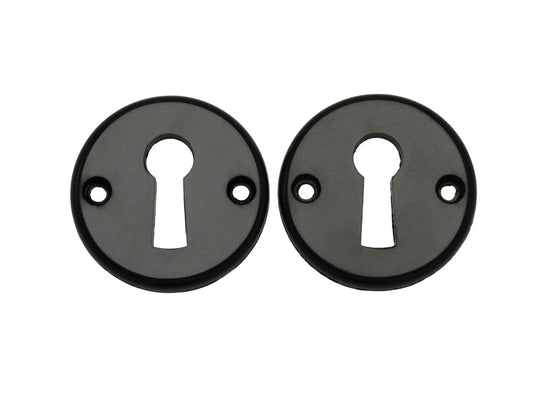Torpedo keyhole escutcheons in black Bakelite for older doors (2 pieces)
