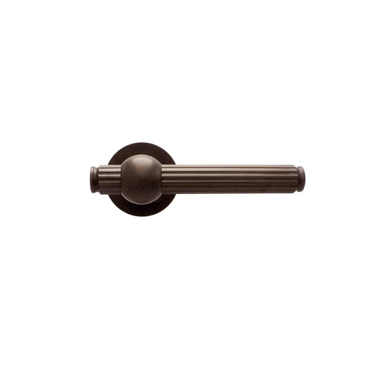 Rex door handle including rose, burnished brass • KYNER & Co