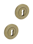 Heritage keyhole escutcheons for older doors, unlacquered polished brass • KYNER & Co