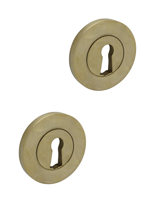 Heritage keyhole escutcheons for older doors, unlacquered polished brass • KYNER & Co
