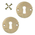 Plan keyhole escutcheons, unlacquered polished brass • KYNER & Co