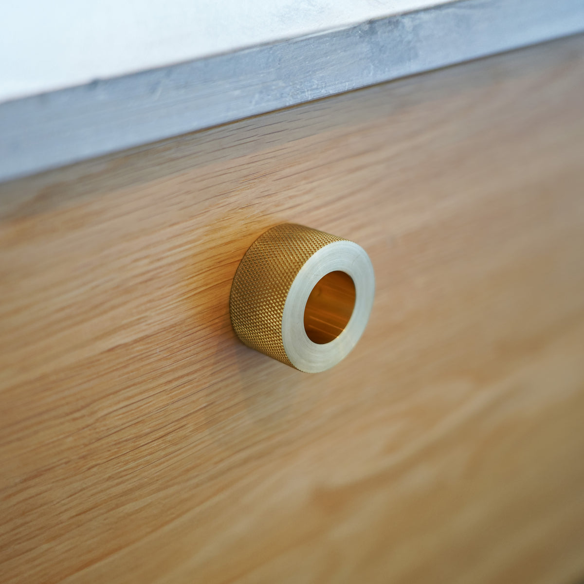 Kastellet diamond-cut cabinet handle in unlacquered brass • Chr. Jørgensen