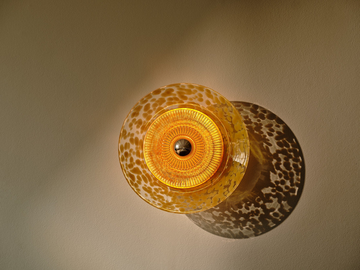 Disco Rama wall light, amber • Design by Us