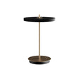 Asteria Move portable table lamp, black and brass • UMAGE