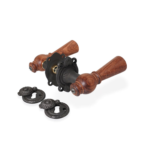 Østerbro mahogany door handle with rose and keyhole escutcheon in black-oxidised brass