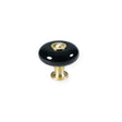Skagen black porcelain knob with brushed brass base • Chr. Jørgensen